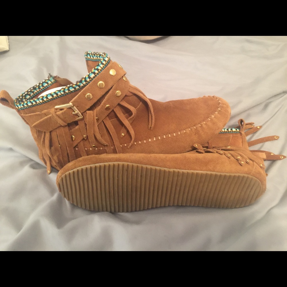 ALDO Native American inspired leather booties