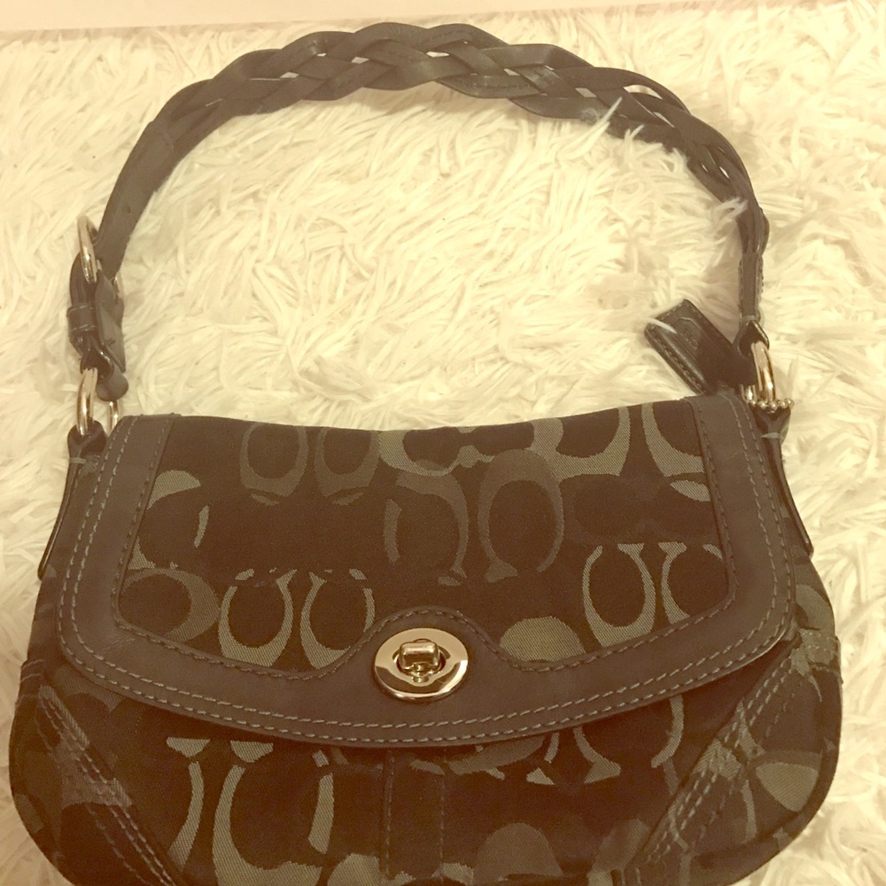 Small, black/gray Coach shoulder bag.