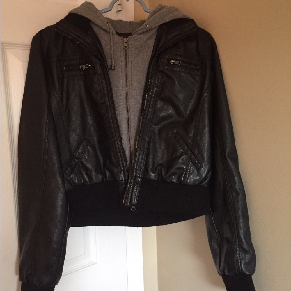 A black leather jacket lined with a gray hoodie