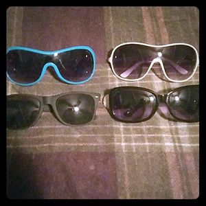 4 pair of sunglasses
