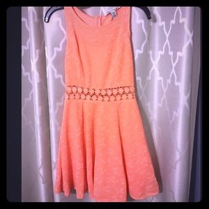 Peach dress with flower cutout