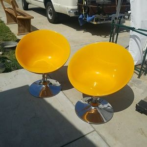 Mid Century Swivel Fiberglass Chairs.