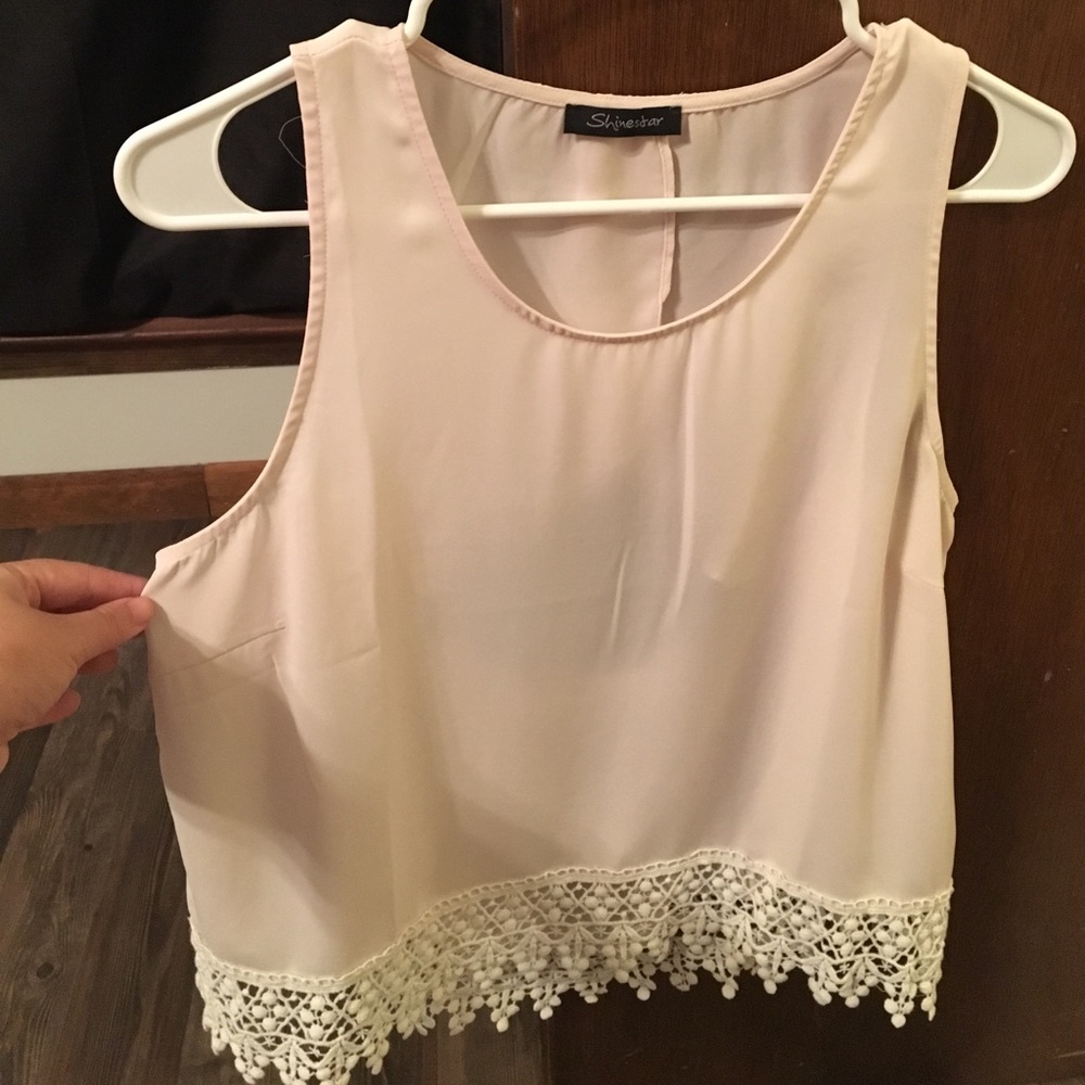 Very cute summer top with lace and open back