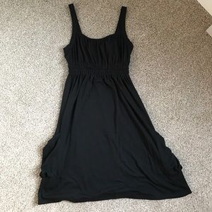 Black thigh length dress with pockets