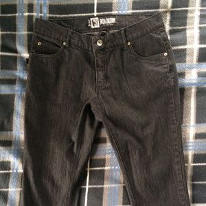 Black Social Collision jeans.