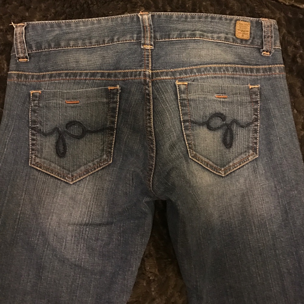 Blue jeans by Guess. Excellent condition.