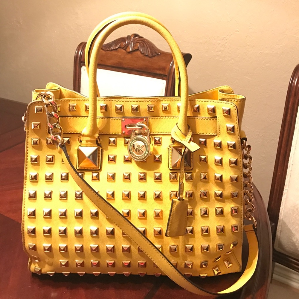 Gently used Yellow studded Michael kors satchel