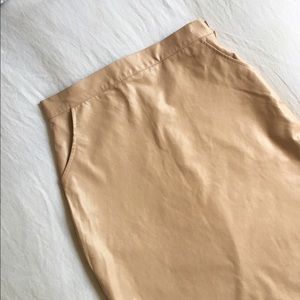 Faux Leather Midi Skirt in Nude.