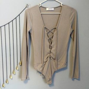 Ribboned onsie with bralike latches, not buttons