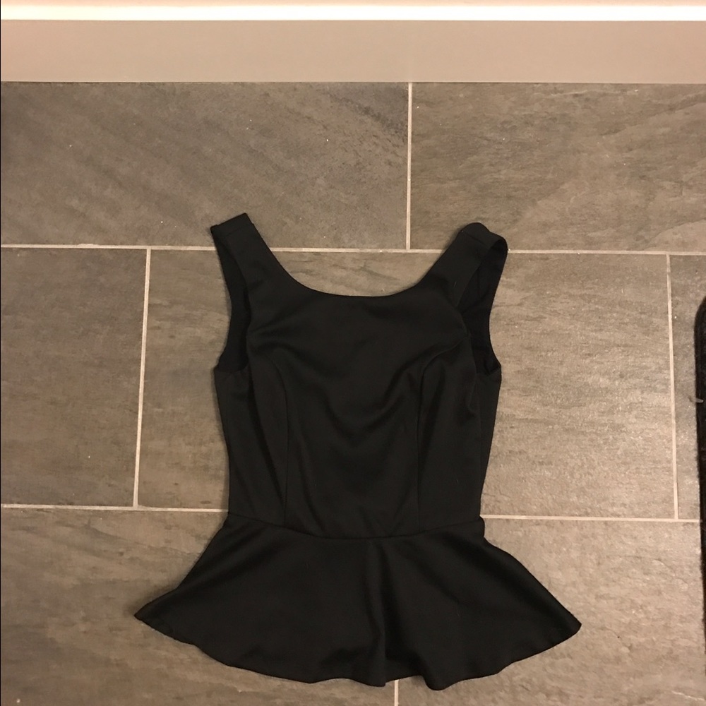 Peplum top with large bow in back