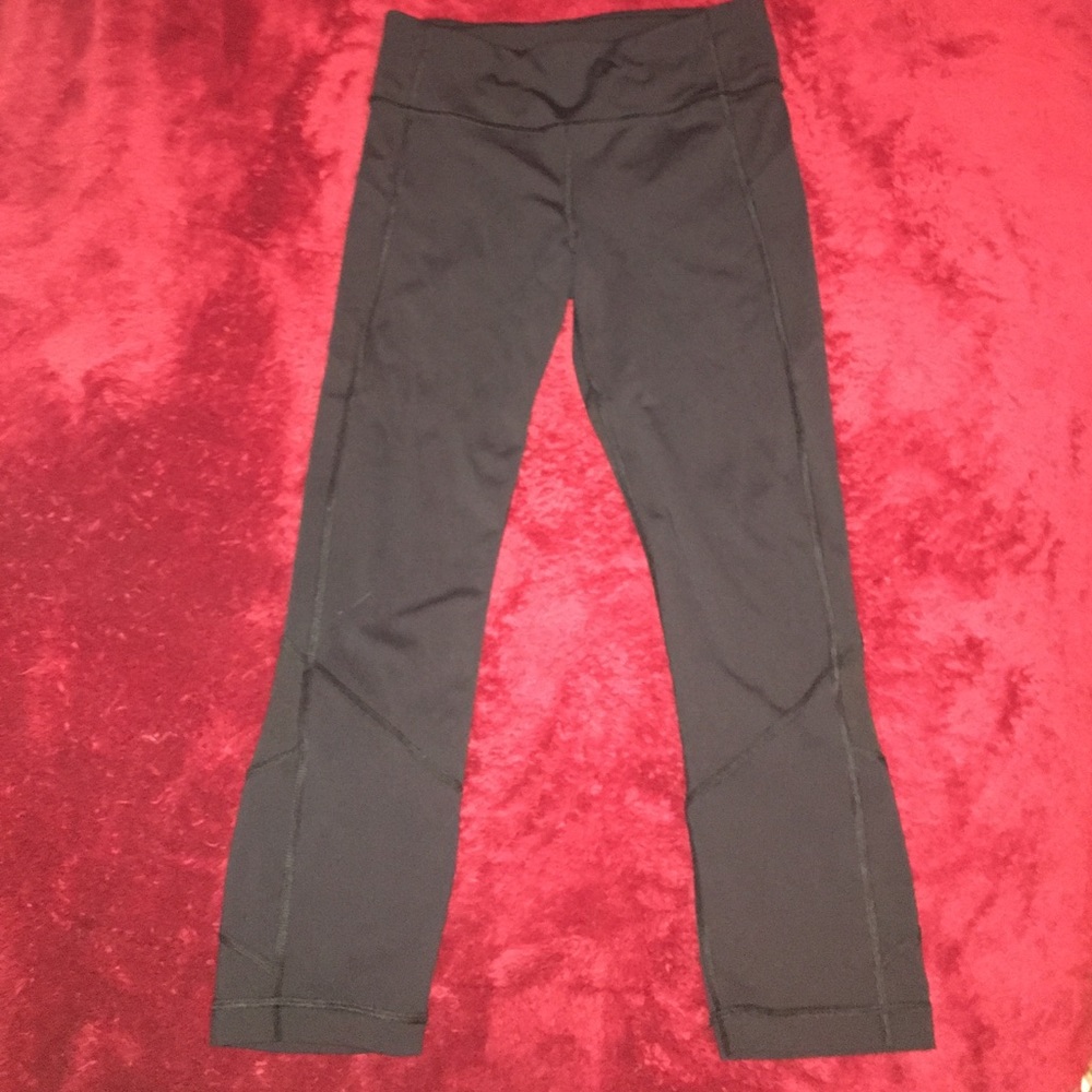 Cropped black with mesh LuLu leggings.