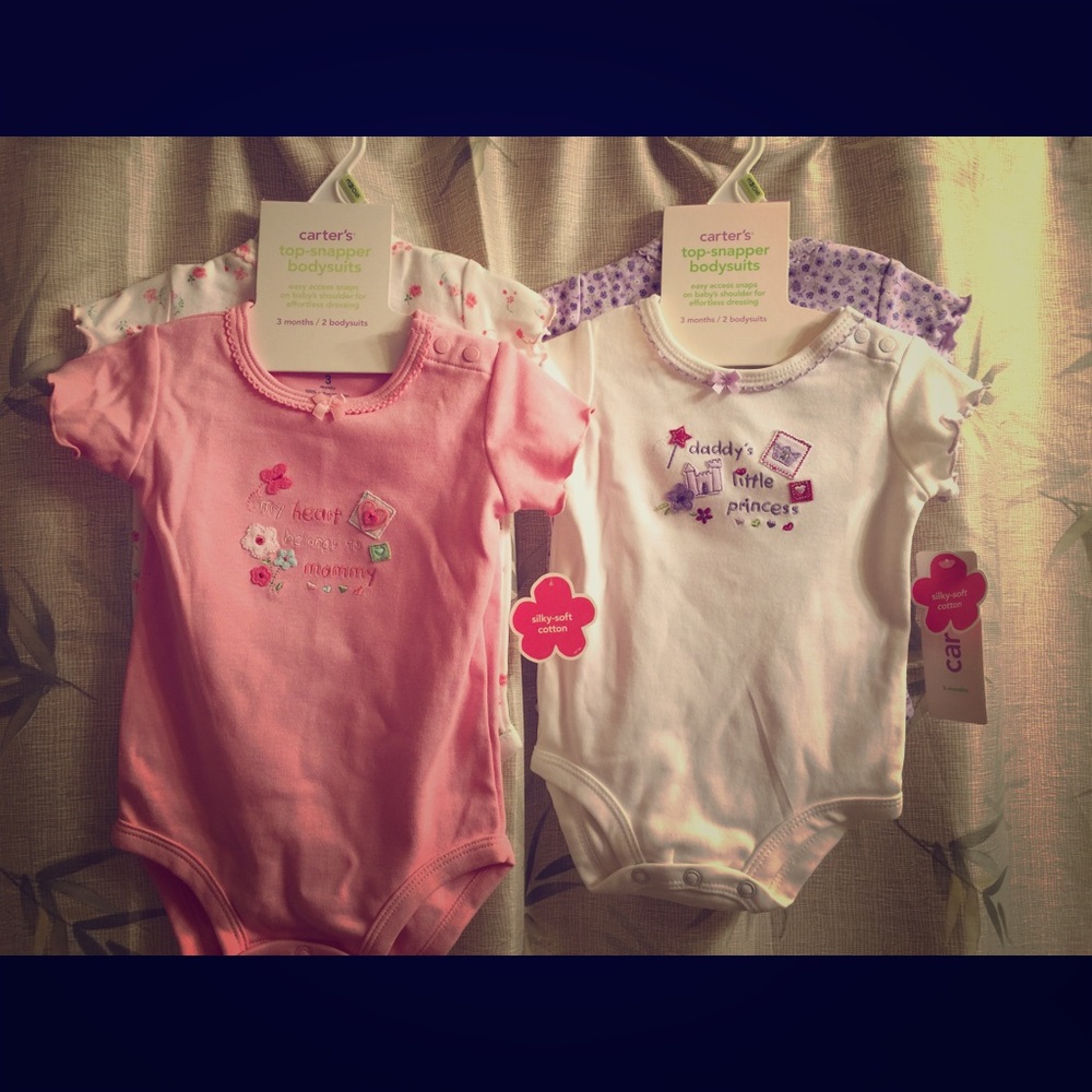 Sold as a lot. Carter's bodysuits age 3 mo.