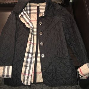 Authentic black Burberry Brit quilted jacket.