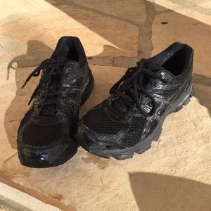 Black Asics running shoes
