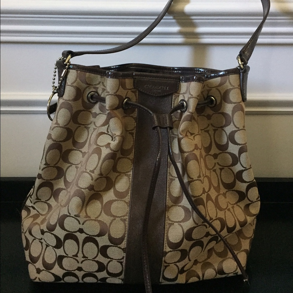 Authentic brown Coach bag. Brand new, no tags.