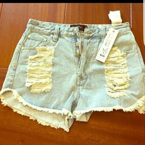 High waisted distressed denim shorts