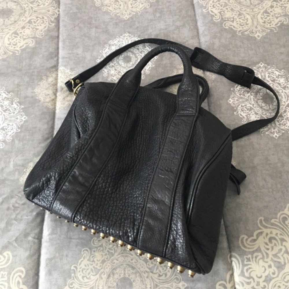 Black studded handbag