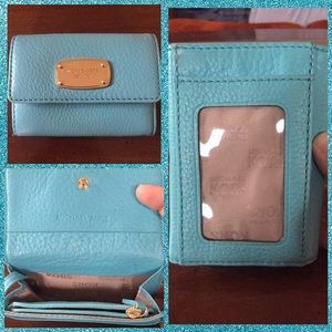Michael Kora Wallet