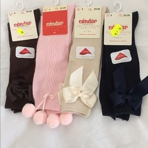 4 pairs of brand new knee high socks