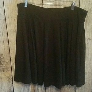 Knee length black skirt