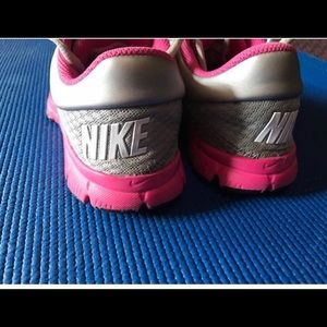 Girls grey and pink nikes