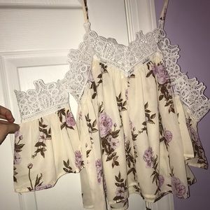 Cream tank with cut out shoulders