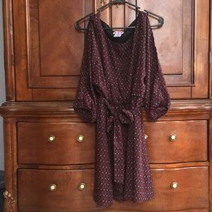 Open shoulder dress.