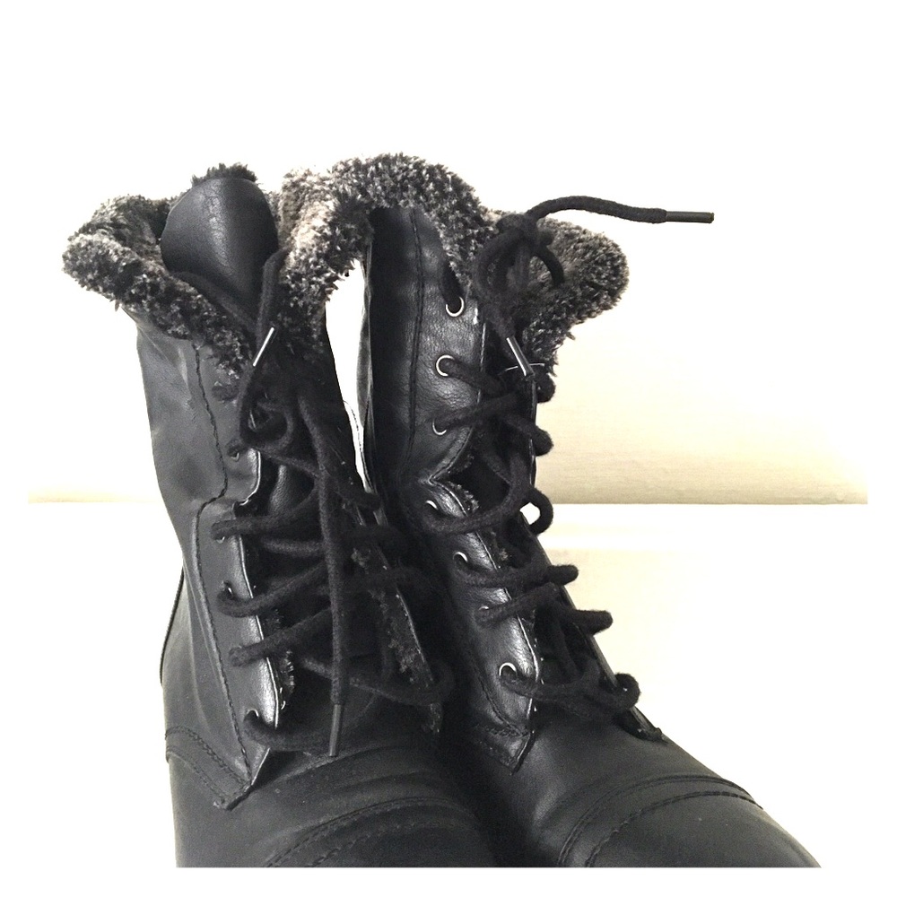 Black combat boots with fur on inside