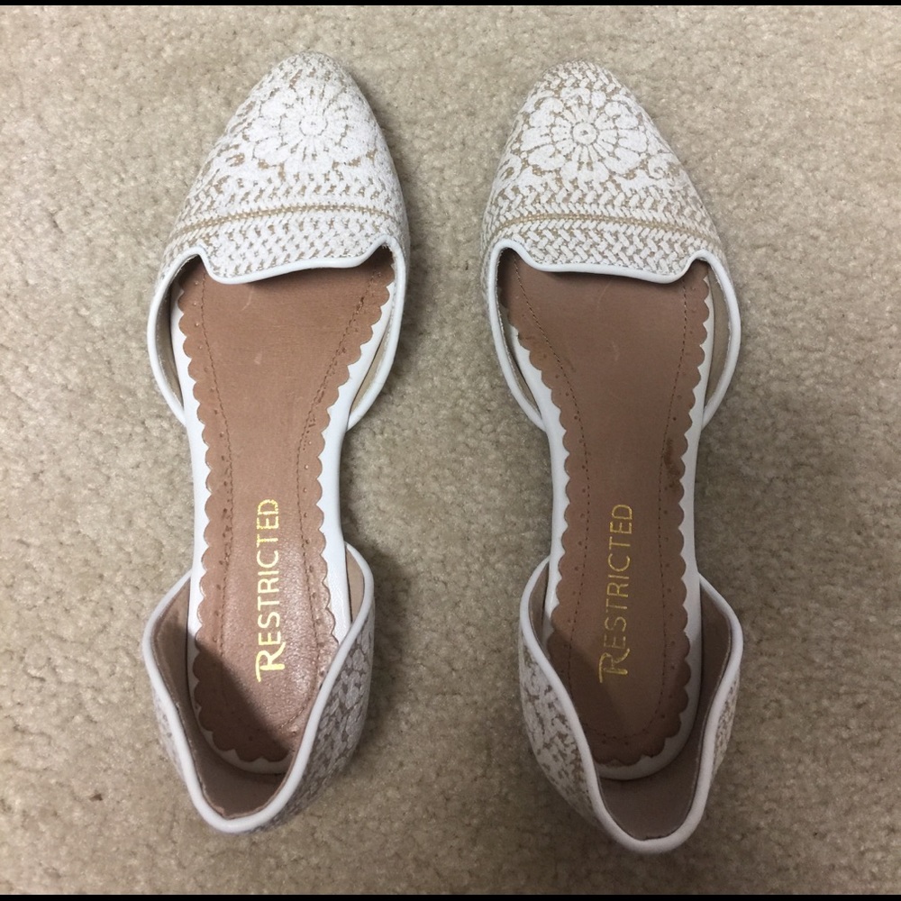 White floral pattern flats from Franchescas