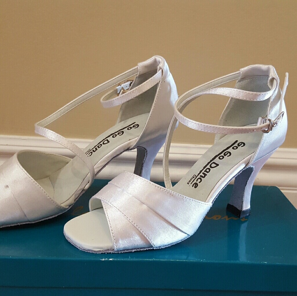 White satin ballroom dance shoes