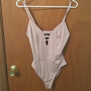 Mauve bodysuit. Unworn