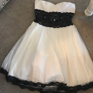 Strapless white with black puffy dress