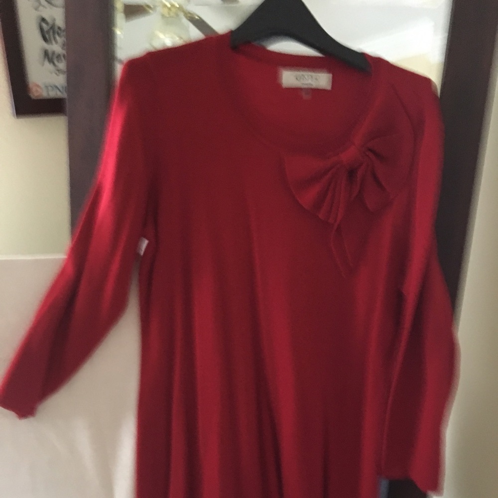 Vibrant red sweater dress with feminine side. bow
