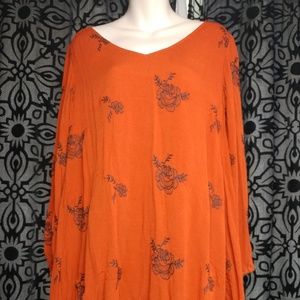 Orange flowy keyhole back dress
