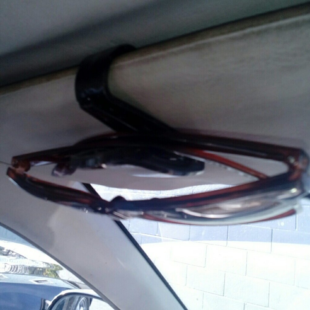 Car sunglasses holder