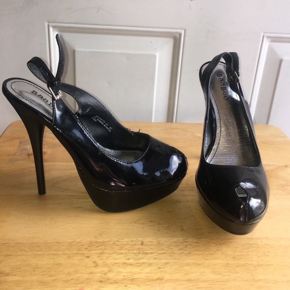 Black slingback platform stilettos. NEW w/o Tag.