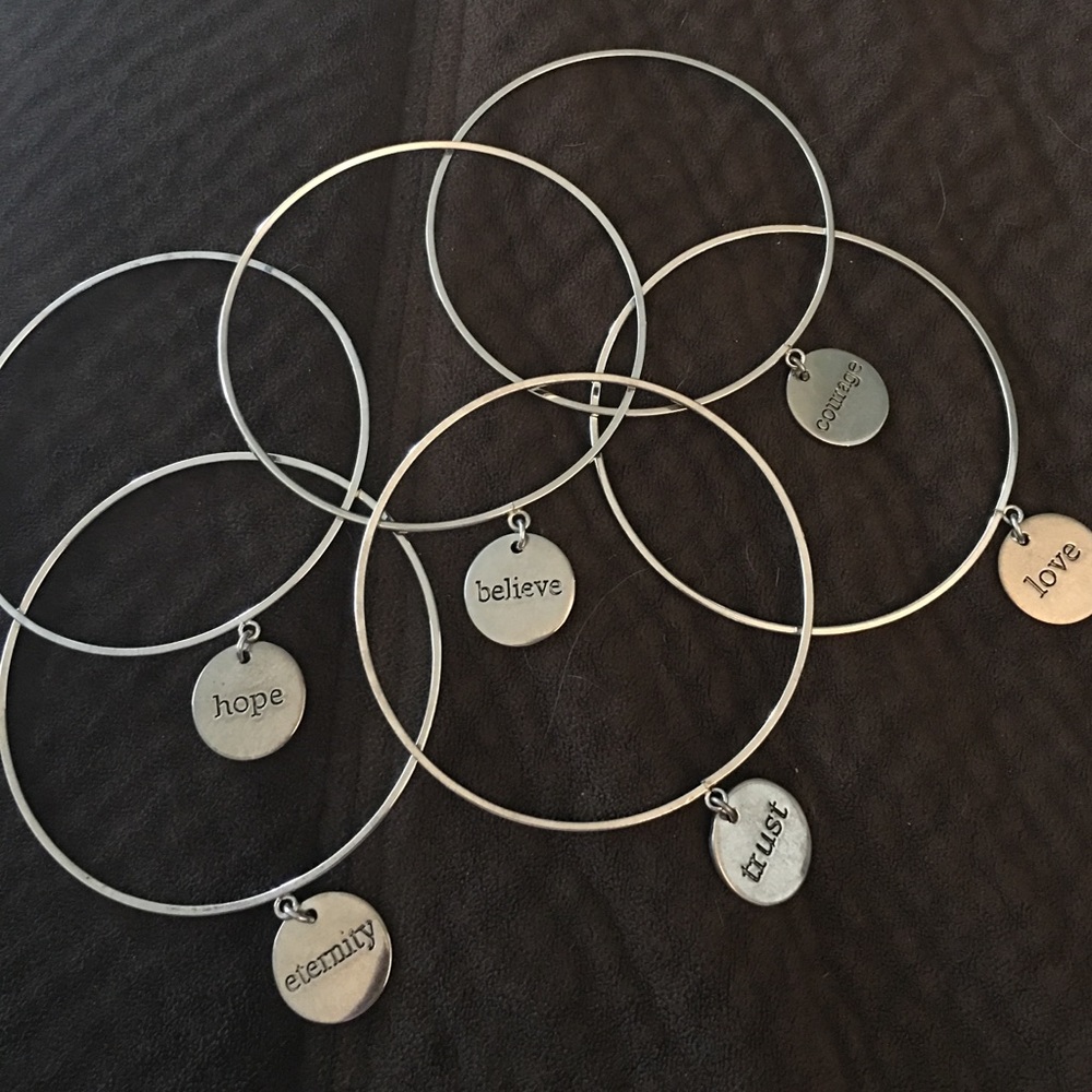 Six silver bangles