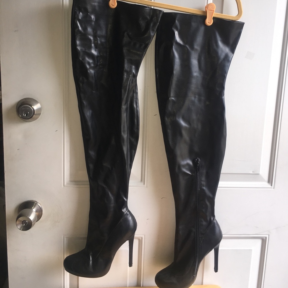 Gently used thigh high patent leather boots.