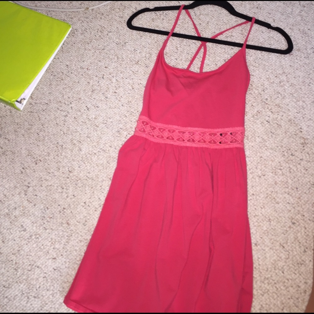 Flowy pink dress with cut out and cross cross back