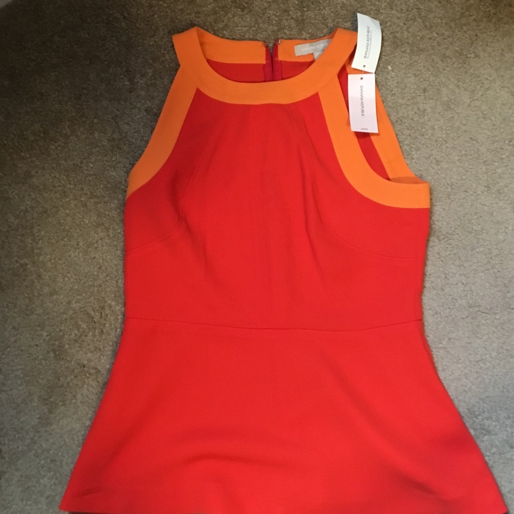Bright orange peplum Banana Republic tank