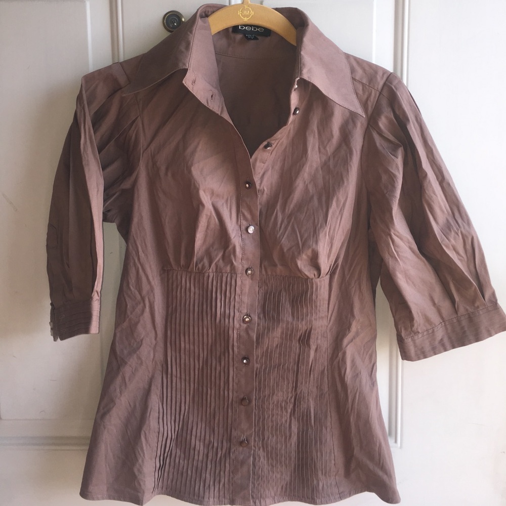 New w/o tag. BEBE button up top.