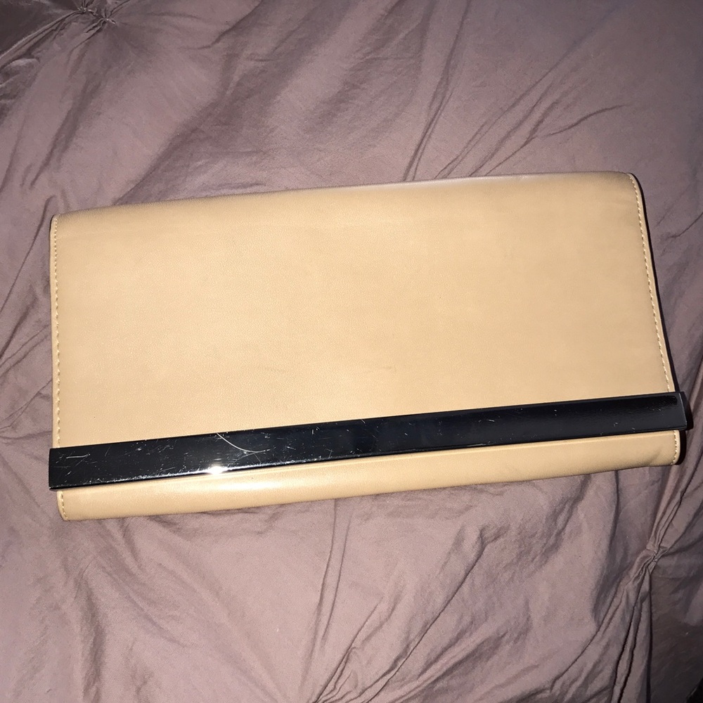 Tan clutch. Faux leather