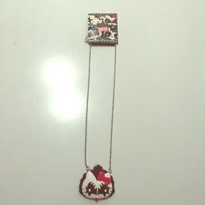 Official Hello kitty Kiss necklace by Claire's!