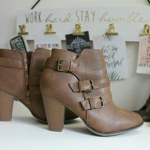Brown buckle heeled ankle boots