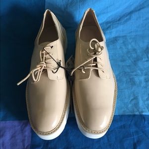 Nude platform loafers