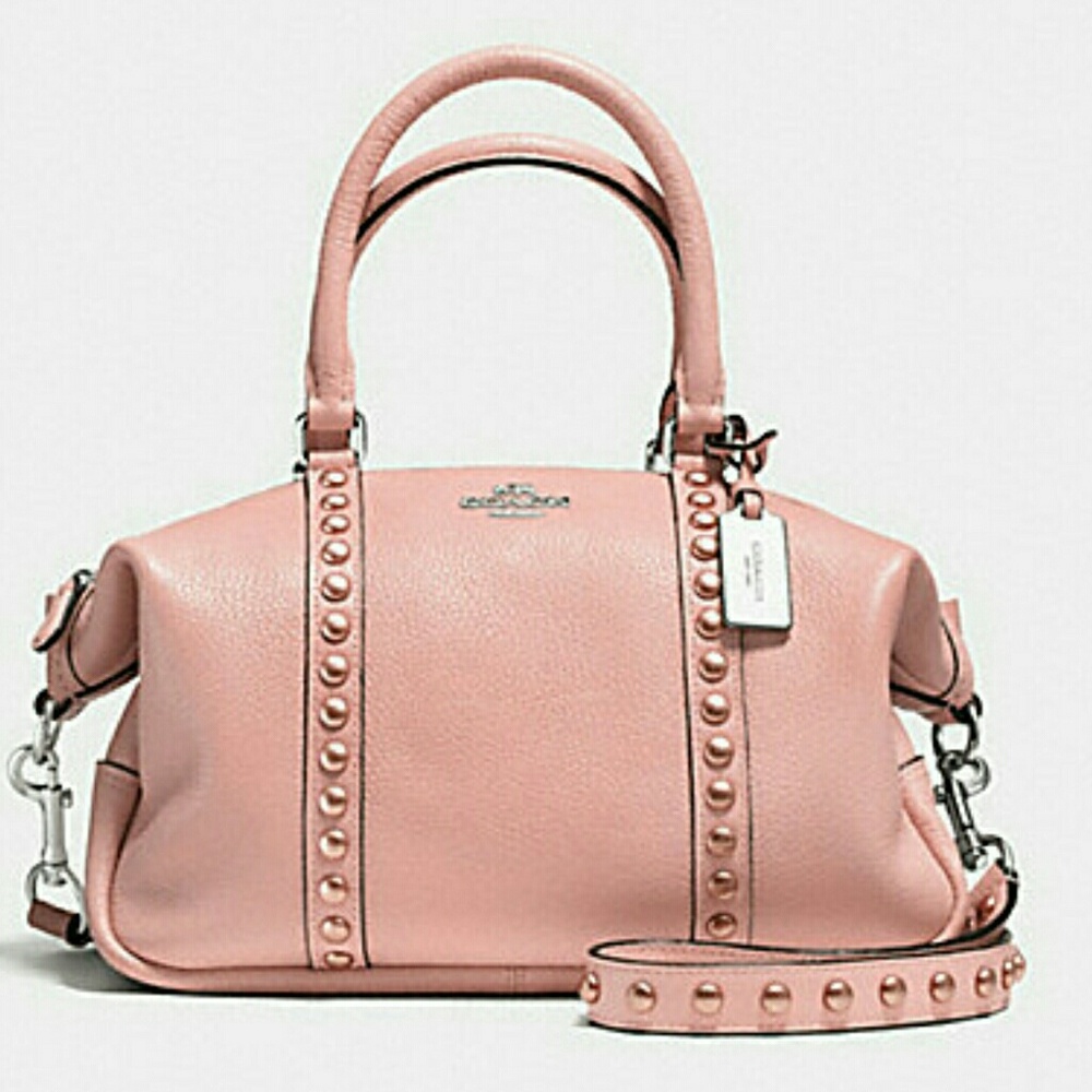 TRADED***Coach central rivets