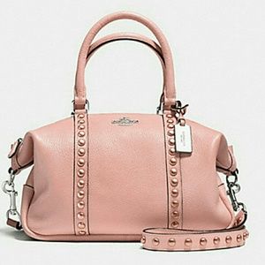 TRADED***Coach central rivets