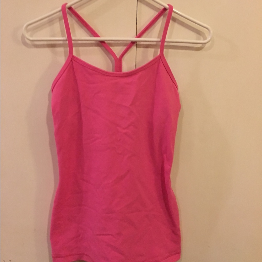 Lululemon pink tank top with built in shelf bra.