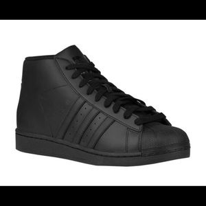 Black Adida High tops