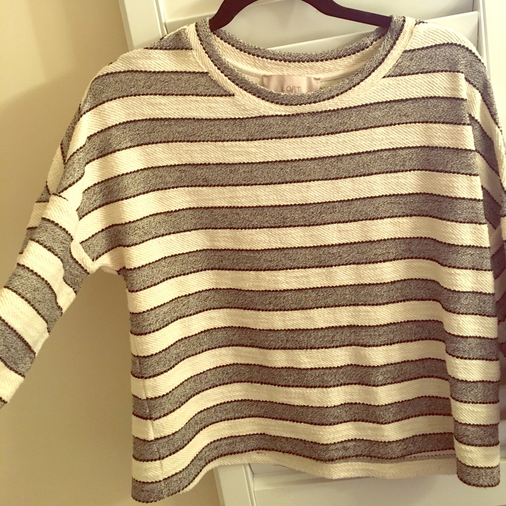 Slight flare striped sweater top